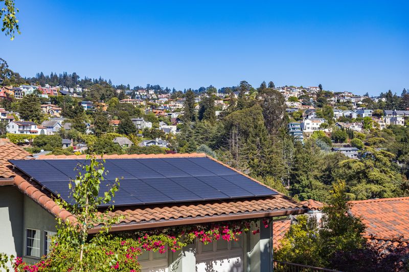 a house with solar panels on the roof